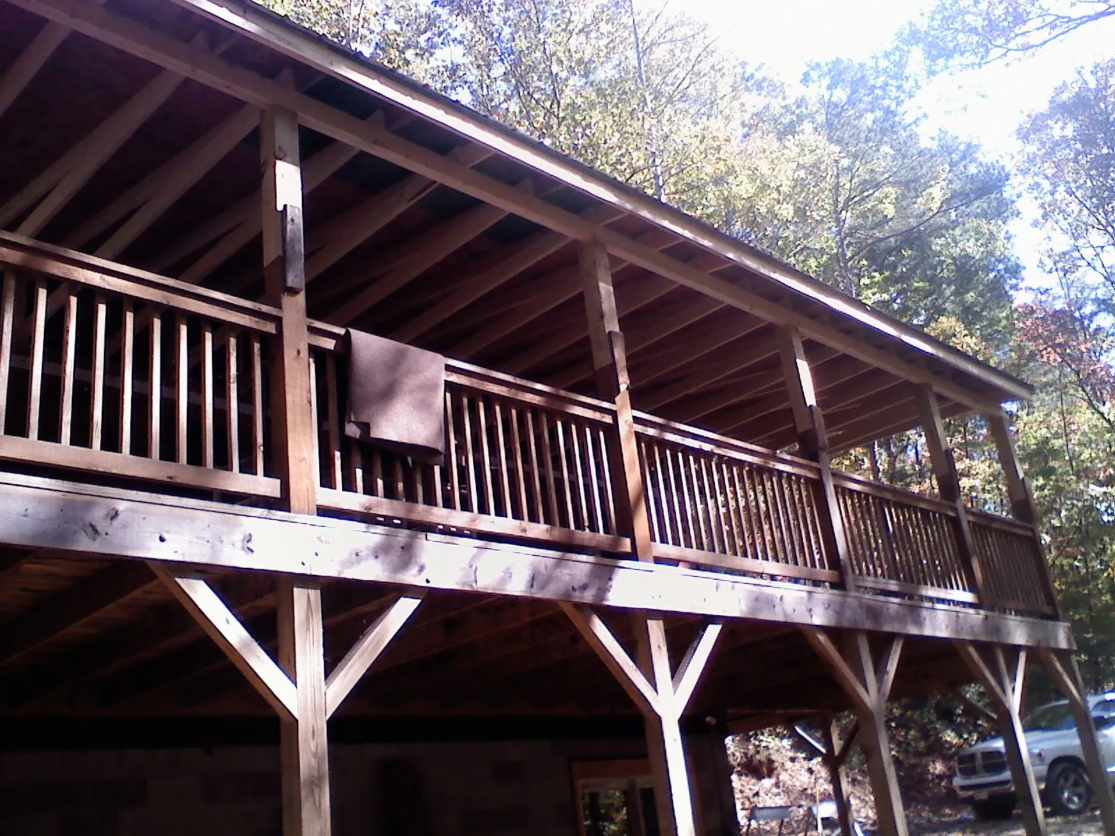 Timber framing under a new elevated porch and deck — Roof Leak Repair in Lyle by Roofing Brothers